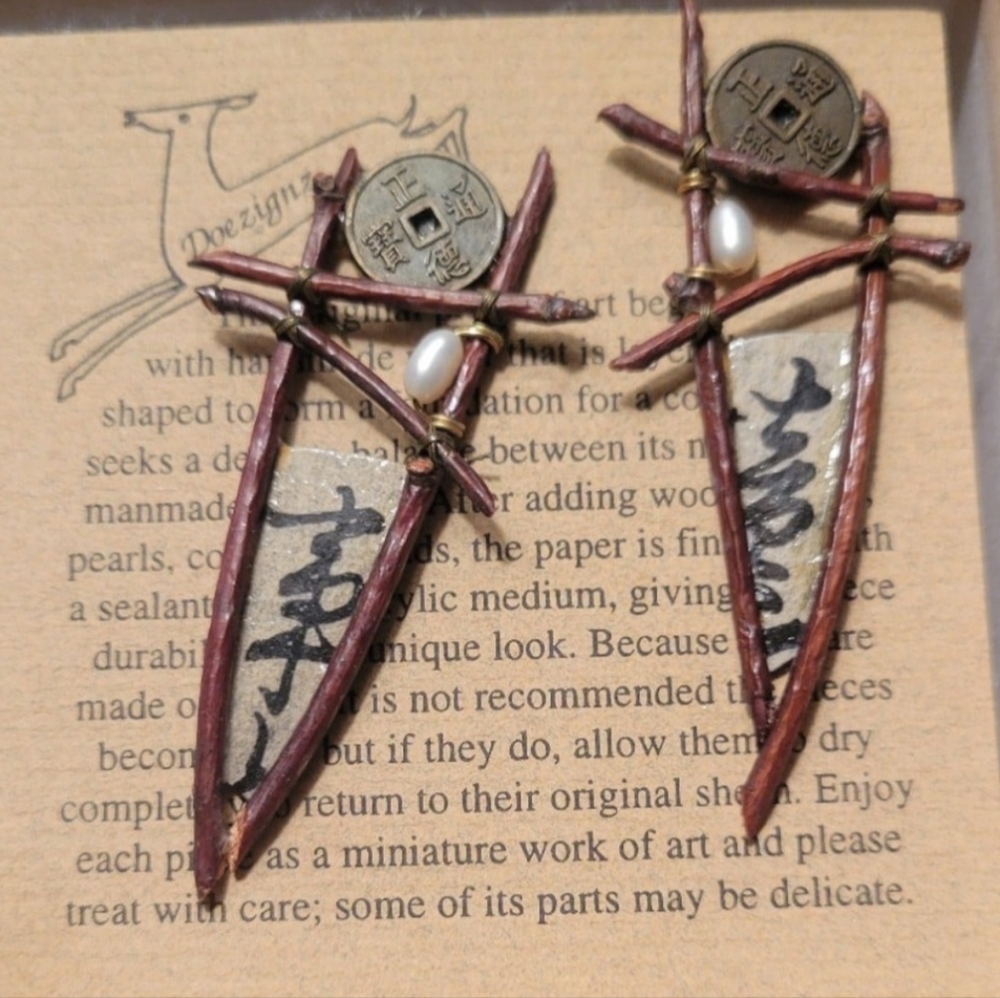 Unique handmade paper, mixed media collage jewelry created by Doe Cross Hayes